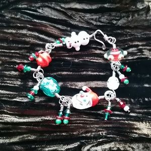 Christmas dangle bracelet with glass santa